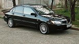 Диски Racing Wheels Classic H-155 көлікте Mitsubishi Lancer Диски Racing Wheels Classic H-155 көлікте Mitsubishi Lancer