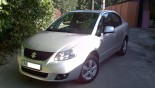 Диски КиК Кон-Тики көлікте Suzuki SX4 Диски КиК Кон-Тики көлікте Suzuki SX4
