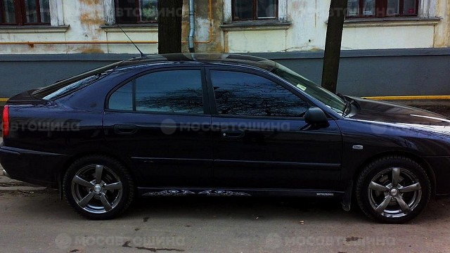 Дискілер Racing Wheels Premium H-337 R16 на автомобиле Mitsubishi Carisma [85]