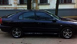 Диски Racing Wheels Premium H-337 көлікте Mitsubishi Carisma Диски Racing Wheels Premium H-337 көлікте Mitsubishi Carisma