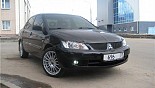 Диски OZ Racing Superturismo GT көлікте Mitsubishi Lancer Диски OZ Racing Superturismo GT көлікте Mitsubishi Lancer