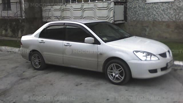 Дискілер Racing Wheels Classic H-109 R15 на автомобиле Mitsubishi Lancer [100]